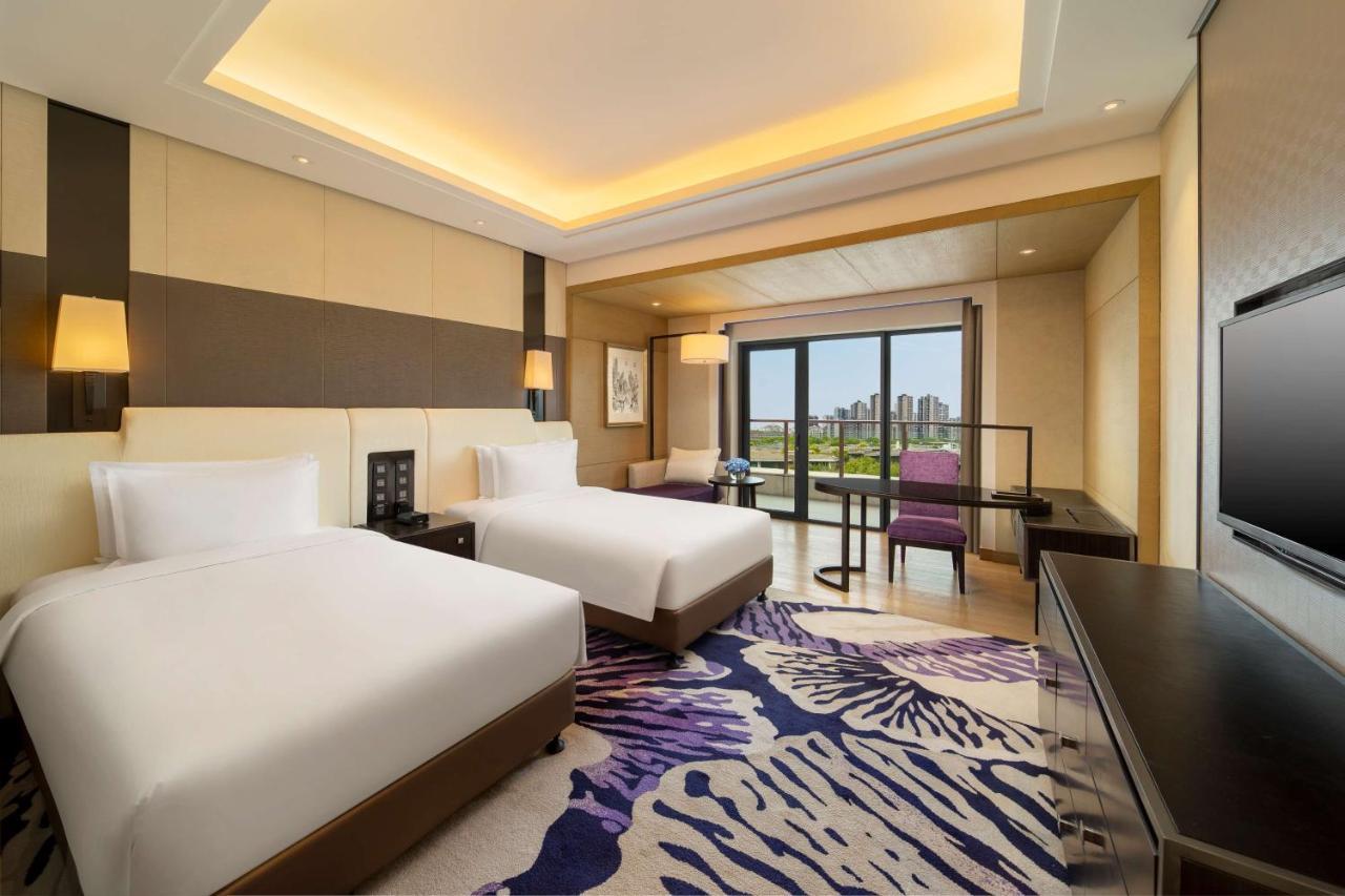 อู๋ฮั่น เหลียนโถว เพนนินซูลา โฮเต็ล แอนด์ รีสอร์ต Hotel อู่ฮั่น ภายนอก รูปภาพ